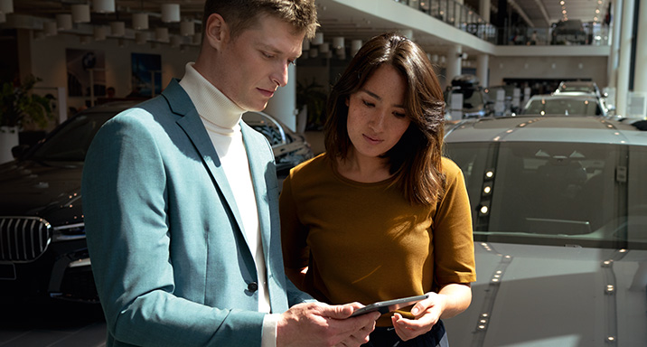 BMW employee advises a customer