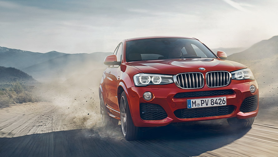 BMW X4 דור ראשון מבט קדמי בנסיעה BMW סדרה X BMW X4 דור ראשון מבט קדמי