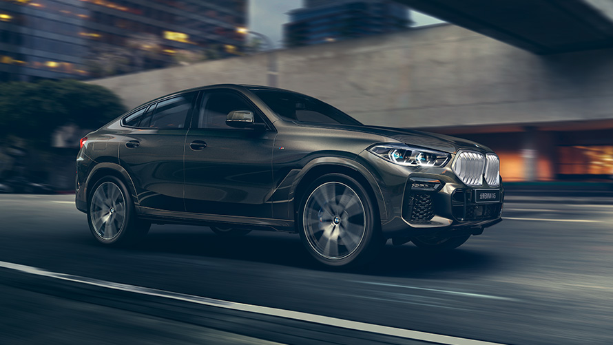 BMW X6 דור שלישי מבט מהצד בעמידה BMW סדרה X BMW X6 דור שלישי מבט מהצד בעמידה