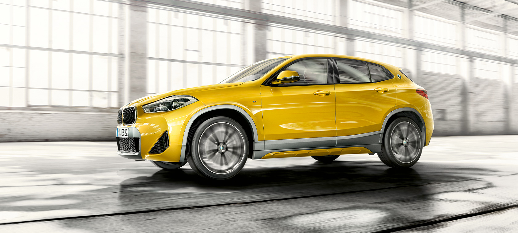 Side view BMW X2 F39 Side view BMW X2 F39 2020 Brooklyn Grey driving