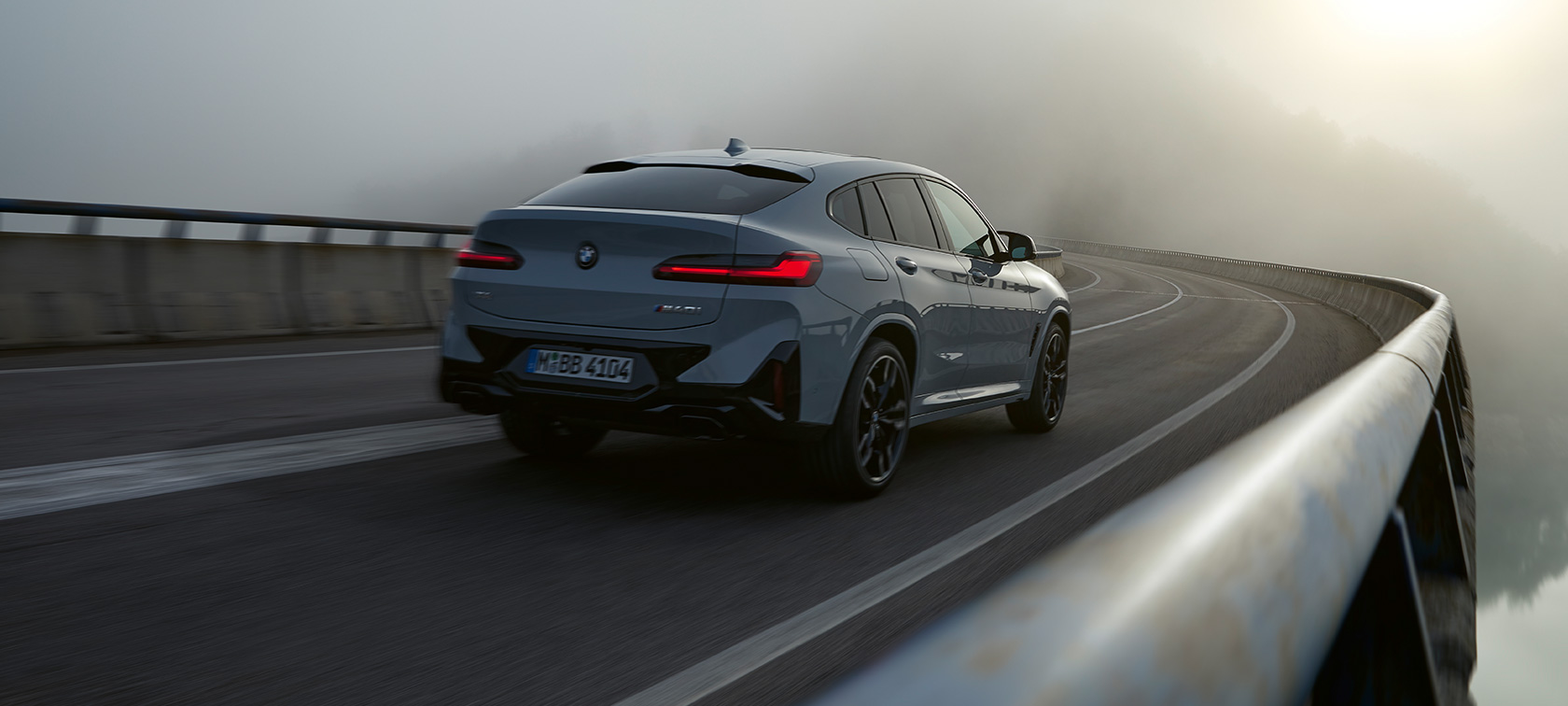 BMW X4 G02 Financial Services 2021 BMW X4 G02 Financial Services Brooklyn Grey three-quarter rear view driving 2021
