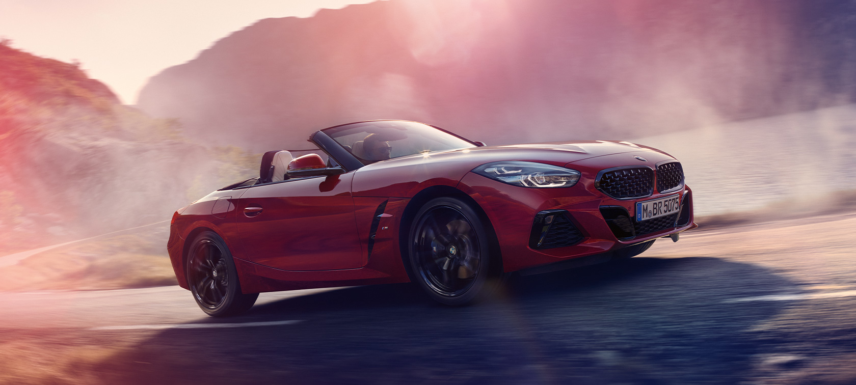 BMW Z4 M40i רודסטר מבט צדדי נהיגה BMW Z4 M40i רודסטר מבט צדדי בנהיגה